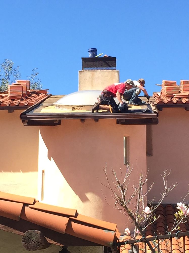 Slide of Sutton Roofing and Solar