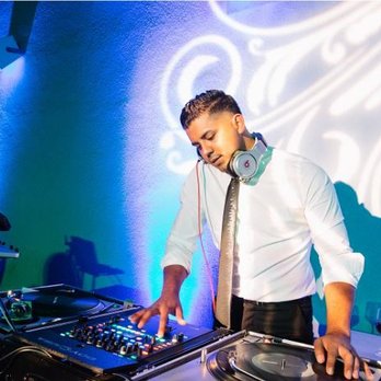 Invisible Touch Events - Juan, our exceptional DJ, spinning it at our wedding in WeHo! - DJs Near Me - Irvine, California Invisible Touch Events - Juan, our exceptional DJ, spinning it at our wedding in WeHo! - DJs Near Me - Irvine, California