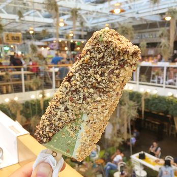 Popbar - I believe it was a green tea pop with white and dark chocolate dip covered with hazelnuts. It was good for a couple bites then meh - Desserts Near Me - Anaheim, California Popbar - I believe it was a green tea pop with white and dark chocolate dip covered with hazelnuts. It was good for a couple bites then meh - Desserts Near Me - Anaheim, California