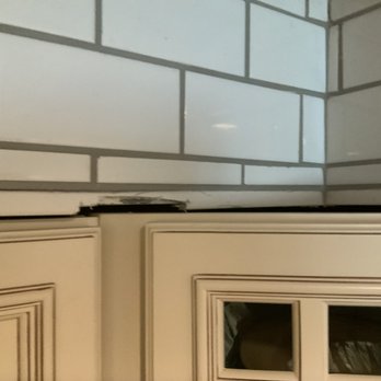 Nailed It Handyman Services - Gouged tiles on both sides. - Handyman Near Me Nailed It Handyman Services - Gouged tiles on both sides. - Handyman Near Me