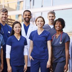 RWJ University Hospital Rahway - A team of doctors being photographed at the hospital.
