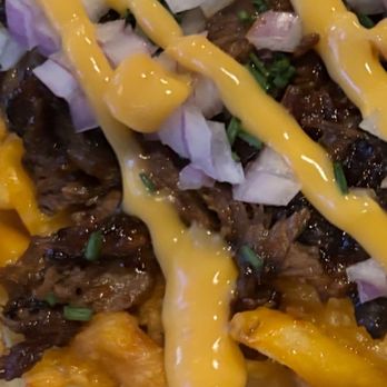 Scoundrels Tavern & Eatery - Zero regrets, 100% cheese coverage - Burgers Near Me - North Las Vegas, Nevada