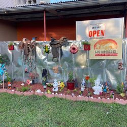Los Caporales Mexican Restaurant - Back flower beds