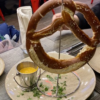 One Elleven - Home made hot pretzel with queso sauce - Wine Bars Near Me - Brooklyn, New York One Elleven - Home made hot pretzel with queso sauce - Wine Bars Near Me - Brooklyn, New York