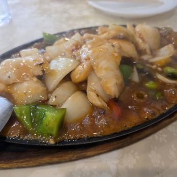 Kevin's Kitchen - fish filet with black bean sauce on sizzling platter - Hong Kong Style Cafe Near Me - Honolulu, Hawaii