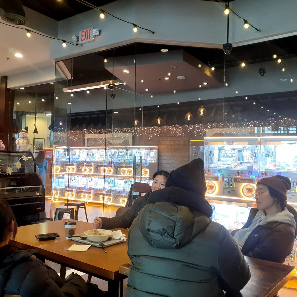 Inside. Vending machines. Communal tables. Inside. Vending machines. Communal tables.