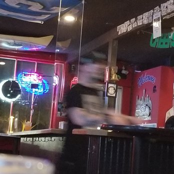 Bert's Tavern - a blurry image of a man sitting at a bar - Dive Bars Near Me - Bothell, Washington Bert's Tavern - a blurry image of a man sitting at a bar - Dive Bars Near Me - Bothell, Washington