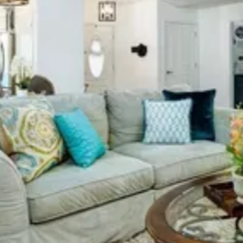 Lucy Dickson Home Staging and Redesign - The sage green couch is mine - the 4 NON MATCHING, NON COORDINATING pillows were her addition. - Interior Design Near Me Lucy Dickson Home Staging and Redesign - The sage green couch is mine - the 4 NON MATCHING, NON COORDINATING pillows were her addition. - Interior Design Near Me