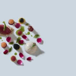 Green Artichoke Private Chef And Catering Services - Honey goat's milk panna cotta, blackberry sorbet, toasted almond dust, basil clover honey, rose scented berry coulis, rose petals