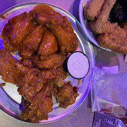 Buffalo medium and Spicy garlic Parmesan bone in wings!!