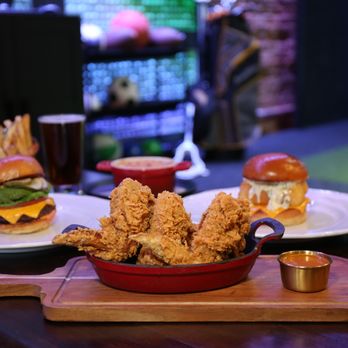 Swing Social - Fried Chicken Wings
breaded whole wings, housemade hot
sauce - Sports Bars Near Me - San Diego, California Swing Social - Fried Chicken Wings
breaded whole wings, housemade hot
sauce - Sports Bars Near Me - San Diego, California