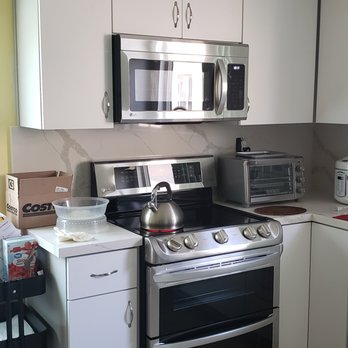 The Cabinet Pros - Range and over the range microwave - Kitchen & Bath Near Me - Brea, California The Cabinet Pros - Range and over the range microwave - Kitchen & Bath Near Me - Brea, California