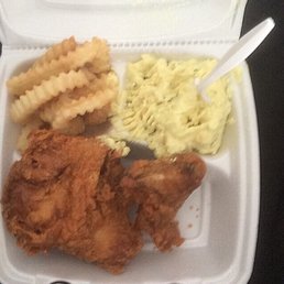 Two piece chicken side of fries and potato salad Two piece chicken side of fries and potato salad