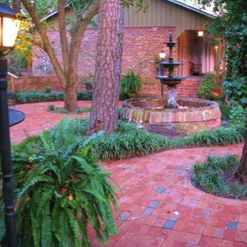 The Country Squire - The Courtyard, which features a fountain, metal outdoor furniture, and an outdoor bar area for parties. - Seafood Near Me - Warsaw, North Carolina The Country Squire - The Courtyard, which features a fountain, metal outdoor furniture, and an outdoor bar area for parties. - Seafood Near Me - Warsaw, North Carolina