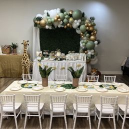 Beautiful balloon garland, backdrop, tables, chairs, themed plates, and white tablecloths provided by Wigglin' Out Beautiful balloon garland, backdrop, tables, chairs, themed plates, and white tablecloths provided by Wigglin' Out