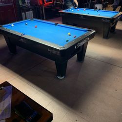 Willie's Lounge - Two pool tables and a microphone