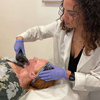DG Aesthetics - Dr. Mundi performing Morpheus8 microneedling with radio-frequency on a client. - Medical Spas Near Me - Long Beach, California