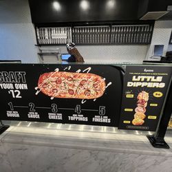&pizza - Prices.  Blocks the view of the ingredients to select from. Remove it.