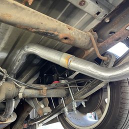 Custom tail pipe tucked up high & tight, exhaust drone is gone!