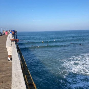 Pacific Terrace Hotel - watching surfers from pier - San Diego, CA