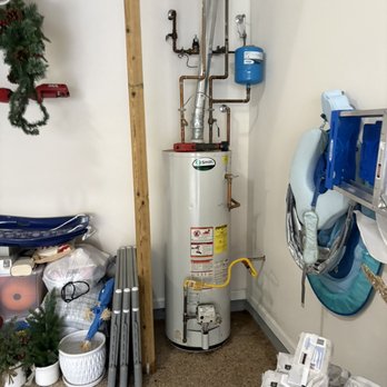 PlumbingPro North Atlanta - Old water heater, high pressure busted in a customers garage and caused a small flood! - Plumbing Near Me - Chamblee, Georgia PlumbingPro North Atlanta - Old water heater, high pressure busted in a customers garage and caused a small flood! - Plumbing Near Me - Chamblee, Georgia