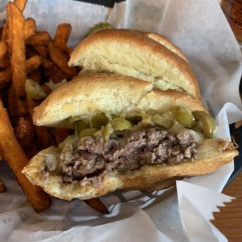 Jiggers Grill - Hand made burger with fresh bun, sautéed green olives and Swiss. Delish and unique - Bars Near Me - Milaca, Minnesota Jiggers Grill - Hand made burger with fresh bun, sautéed green olives and Swiss. Delish and unique - Bars Near Me - Milaca, Minnesota