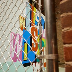 Wilson Flagship - Soho - The mural designed by NYC artist Greg Lamarche in Thomas E. Wilson Park at the Wilson Flagship Store.