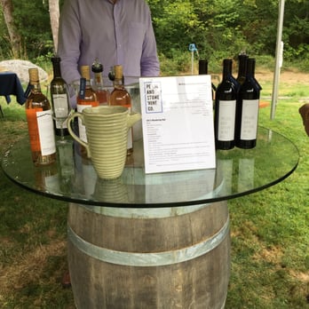 Pearl And Stone Wine - a man at a wine tasting - Wineries Near Me - North Bend, Washington Pearl And Stone Wine - a man at a wine tasting - Wineries Near Me - North Bend, Washington
