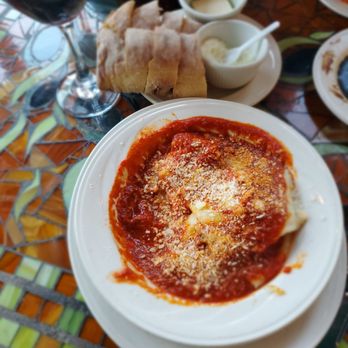 Gregorio's Restaurant - Handmade cheese stuffed ravioli with tomato sauce and delicious bread. - Italian Near Me - Carlsbad, California Gregorio's Restaurant - Handmade cheese stuffed ravioli with tomato sauce and delicious bread. - Italian Near Me - Carlsbad, California