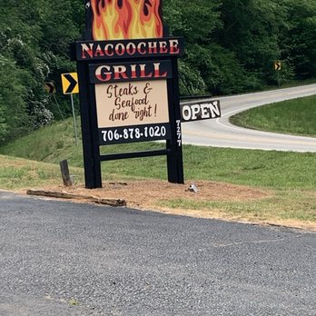 Nacoochee Grill - This is the new owners sign! Call them for reservations number for reservations - Steakhouses Near Me - Helen, Georgia Nacoochee Grill - This is the new owners sign! Call them for reservations number for reservations - Steakhouses Near Me - Helen, Georgia