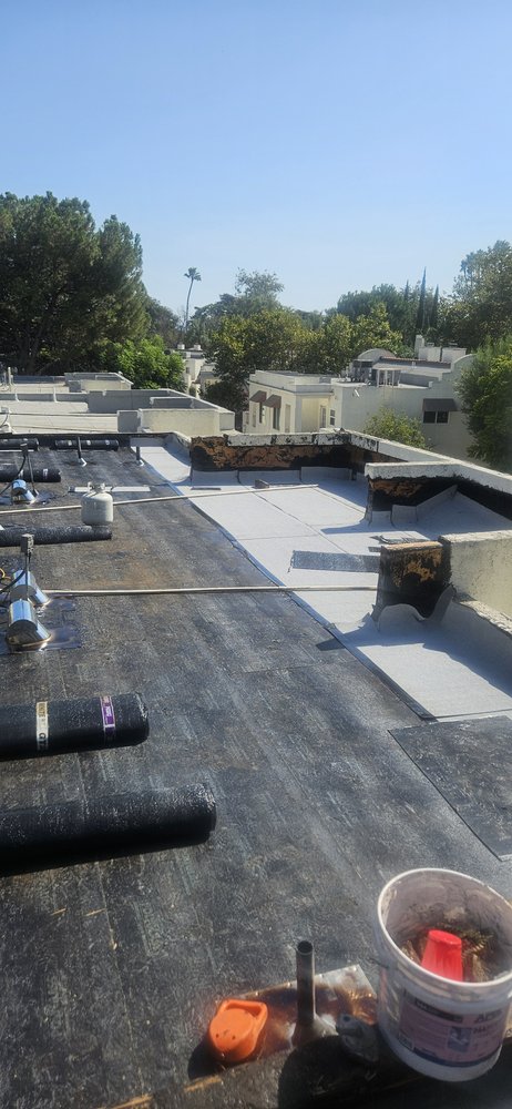 Slide of Femat Roofing