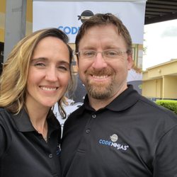 Code Ninjas - Saint Johns - Owners - Ed and Yulia - at a local school event as business partners
