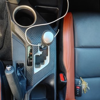 Hughes AutoSpa - Rav4 center console after - Auto Detailing Near Me - Denver, Colorado Hughes AutoSpa - Rav4 center console after - Auto Detailing Near Me - Denver, Colorado