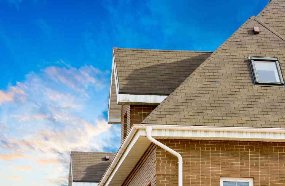 Slide of Two Men Roofing