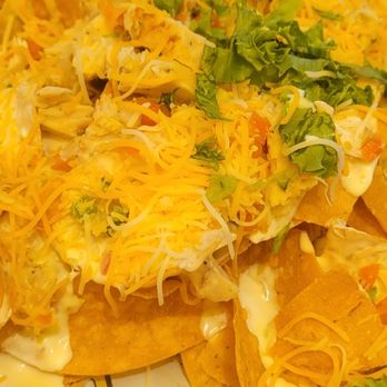 Flora-Bama Lounge, Package & Oyster Bar - Chicken nachos - Music Venues Near Me - Pensacola, Florida