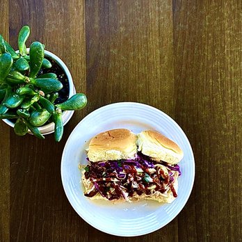 Kinship Cafe - The KCK Smoked Chicken Slider
House-made slaw and Smokey by Nature smoked pulled-chicken on a Hawaiian roll! - Coffee & Tea Near Me - Kansas City, Kansas Kinship Cafe - The KCK Smoked Chicken Slider
House-made slaw and Smokey by Nature smoked pulled-chicken on a Hawaiian roll! - Coffee & Tea Near Me - Kansas City, Kansas