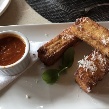 Kitchen76 - Polenta Parmesan fries.....do NOT pass up! So delicious with or without the tomatoey dipping sauce. - Italian Near Me - Niagara-on-the-Lake, Ontario Kitchen76 - Polenta Parmesan fries.....do NOT pass up! So delicious with or without the tomatoey dipping sauce. - Italian Near Me - Niagara-on-the-Lake, Ontario