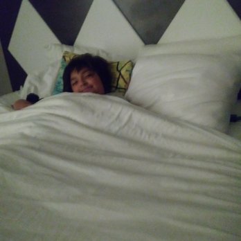 Kings Inn San Diego - My daughter living her best life in a bed all to herself. - San Diego, CA
