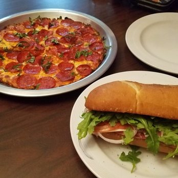Tomori's Pizza & Subs - Pizza Near Me - Lakewood, Ohio Tomori's Pizza & Subs - Pizza Near Me - Lakewood, Ohio
