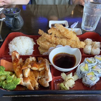 Kumo Japanese Cuisine - chicken teriyaki box with shrimp tempura, shumai, and I believe these are California rolls with rice and vegetables on the side - Japanese Near Me - Franklin Square, New York Kumo Japanese Cuisine - chicken teriyaki box with shrimp tempura, shumai, and I believe these are California rolls with rice and vegetables on the side - Japanese Near Me - Franklin Square, New York