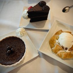 Espresso crepe brûlée, chocolate cake, peach dessert feast. We ordered extra desserts to take back to family.