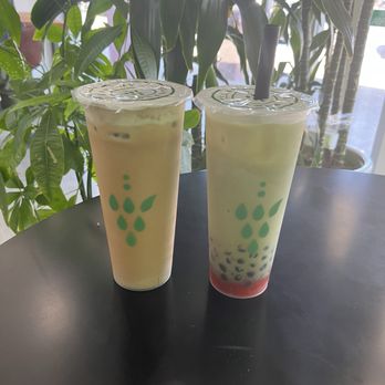 Teanery - Iced Tiramisu Latte on left - Strawberry Matcha with Boba on right - Bubble Tea Near Me - Los Angeles, California Teanery - Iced Tiramisu Latte on left - Strawberry Matcha with Boba on right - Bubble Tea Near Me - Los Angeles, California