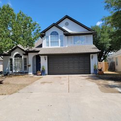 That 1 Painter - Result of Exterior painting of That 1 Painter East Austin Bastrop. Brick masonry flat white. Trims and door brown.
