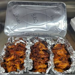Sunshine's Wings and Catfish - Lemon pepper wet, BBQ, and Hot tossed wings