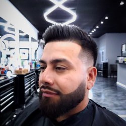 Redemption Hair Studio - Med fade ,combover with texture with a beard lineup