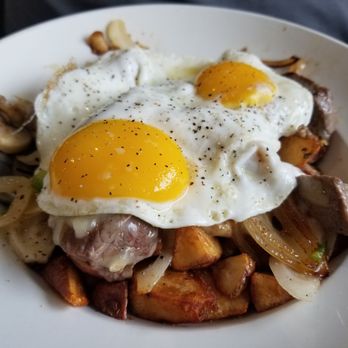 Cafe Stelio's - Ranch Skillet: Red potatoes, fresh mushrooms, onions, perfectly seasoned tender steak swimming in their own juices - Breakfast & Brunch Near Me - Merrillville, Indiana Cafe Stelio's - Ranch Skillet: Red potatoes, fresh mushrooms, onions, perfectly seasoned tender steak swimming in their own juices - Breakfast & Brunch Near Me - Merrillville, Indiana