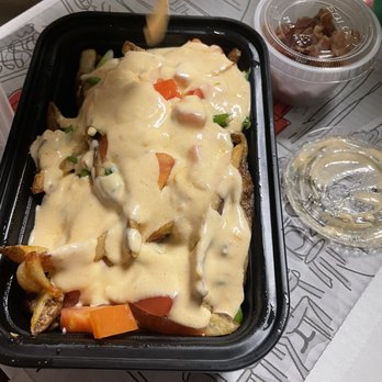 Patrick Henry's Pub & Grille - Fries with queso sauce - Dive Bars Near Me - Richmond, Virginia Patrick Henry's Pub & Grille - Fries with queso sauce - Dive Bars Near Me - Richmond, Virginia
