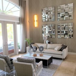 Modern living room. Custom furniture. Paint. New mirrors, drapery, and custom area rug.