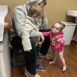 Children and Teens Medical Center - Happy kiddos with dad right before a shot. Neither are scared.