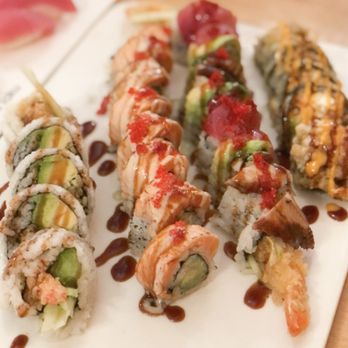 Sushi Taku - signature roll & regular roll. [left to right] shrimp tempura, fire phoenix, color dragon, tuna mango roll - Japanese Near Me - Chicago, Illinois